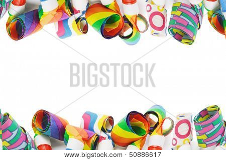 Assorted Party Blowers Border On White Background