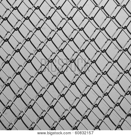 Obsolete Gray Grunge Concrete Closed With Chain Link Fence And Shadows