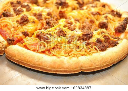 Close-up Of Taco Meat And Cheese Pizza