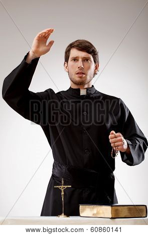 Priest Is Preaching A Sermon