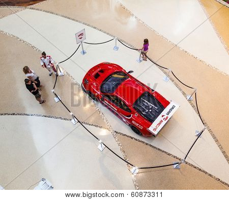 red Ferrari F430 GT in a shopping center at The Strip