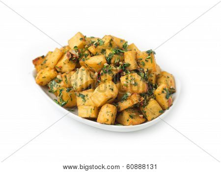 Spicy potato cut in cubes and fried, lebanese cuisine