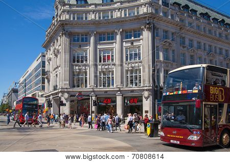 LONDON, UK - JULY 29, 2014: Regent street in London, tourists and busses