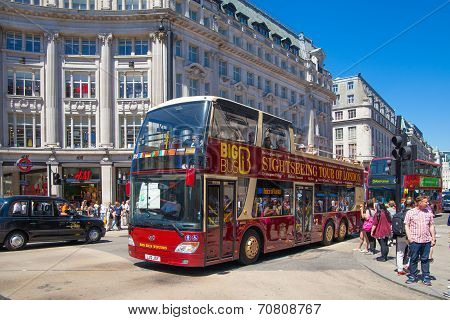 LONDON, UK - JULY 29, 2014: Regent street in London, tourists and busses