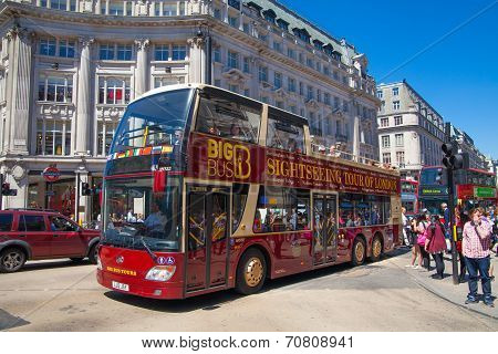 LONDON, UK - JULY 29, 2014: Regent street in London, tourists and busses