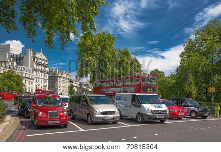 LONDON, UK - JULY 29, 2014: Regent street in London, tourists and busses