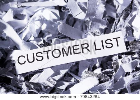 shredded paper tagged with customer list, symbol photo for data destruction, data protection and customer data