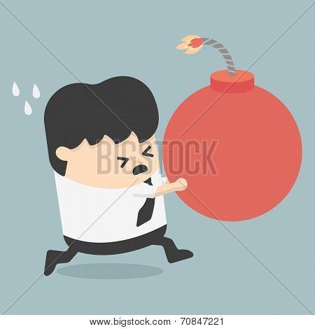 A Business Man Holding A Large Bomb