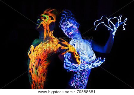 Body art glowing in ultraviolet light,  four elements, Air against Fire