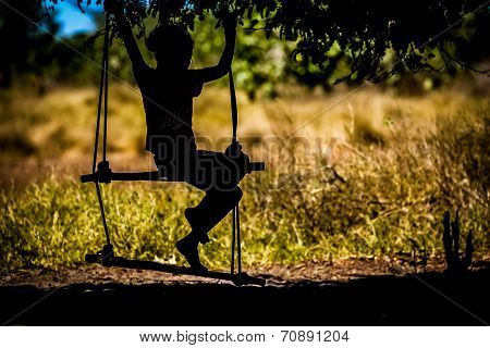 Malagasy girl on a swing