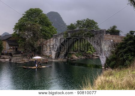 Cruising On  Bamboo Boat In Yulong River, Guilin, Guangxi, China.