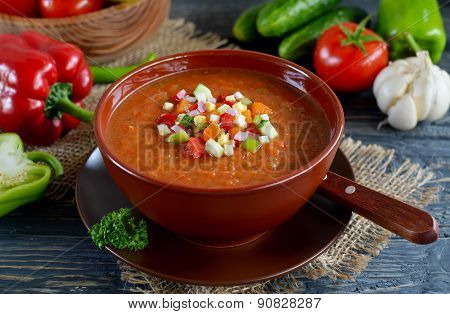Fresh Gazpacho On A Wooden Table