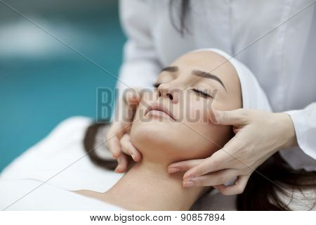 Woman receiving spa treatment