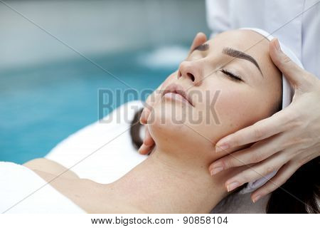 Young woman getting a massage in a spa
