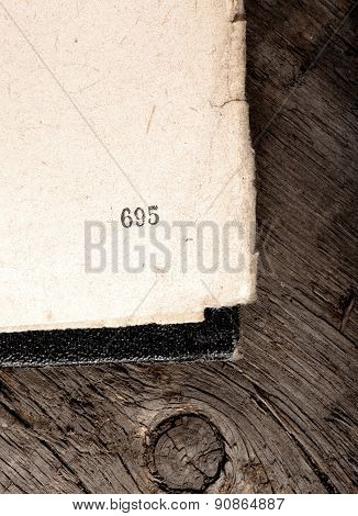 Old Shabby Book Apened On Obsolete Wood Background