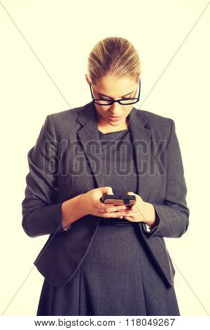 Businesswoman sending a message