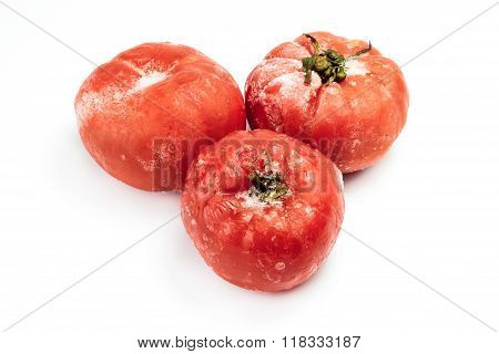 Frozen Tomatoes Isolated On White Background