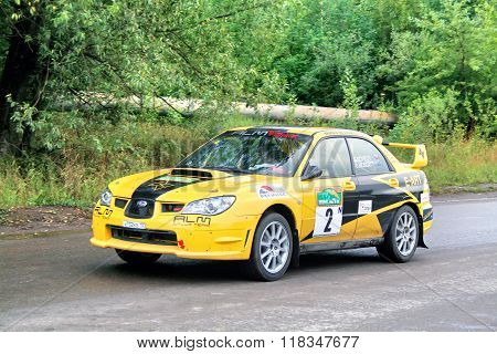 BAKAL RUSSIA - AUGUST 8: Evgeny Novikov's Subaru Impreza WRX (No. 2) competes at the annual Rally Southern Ural on August 8 2008 in Bakal Satka district Chelyabinsk region Russia.