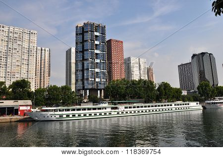 View On Seine River And Skyscrapers In Paris, France.