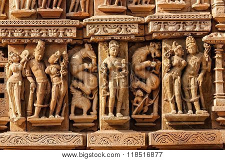 Stone carving bas relief sculptures on Adinath Jain Temple, famous indian tourist site Khajuraho, Madhya Pradesh, India