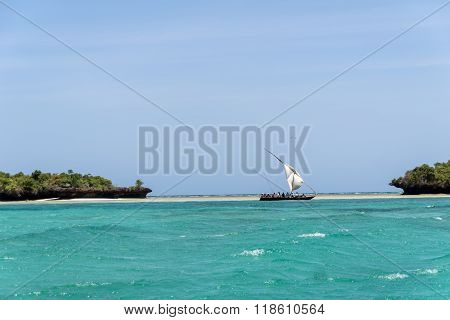 Local wooden boat sailing the Indian Ocean, Tanzania