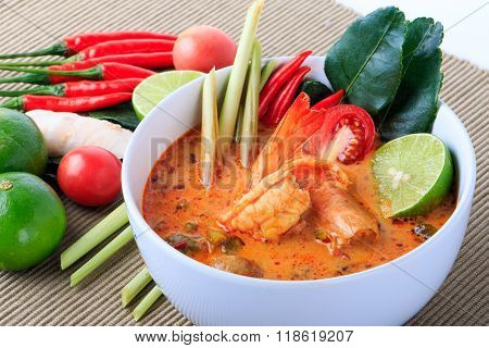 Thai Prawn Soup with Lemongrass (Tom Yum Goong) On Brown Cloth Background.
