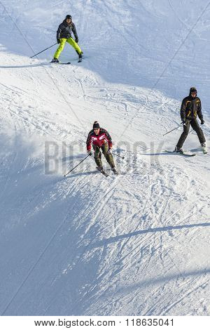 Skier Going Down The Ski Slope