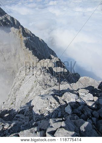 Mountain Watzmann via ferrata climbing route above the clouds