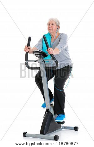 Female Senior Train With Fitness Machine