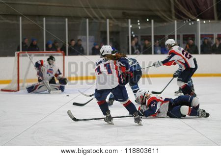 ST. PETERSBURG, RUSSIA - FEBRUARY 17, 2016: Women's ice hockey match Dinamo Saint-Petersburg vs Biryusa Krasnoyarsk. The teams fighting for 3rd place in Russian women's ice hockey championship