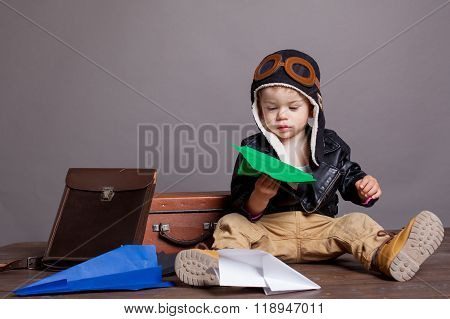 Boy plays airplanes