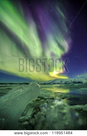 Auroral Over The Glacier Lagoon Jokulsarlon In Iceland.