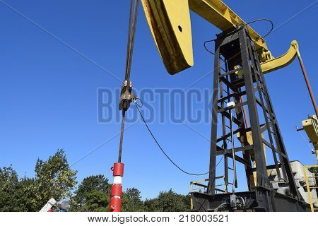 The pumping unit as the oil pump installed on a well. Equipment of oil fields.
