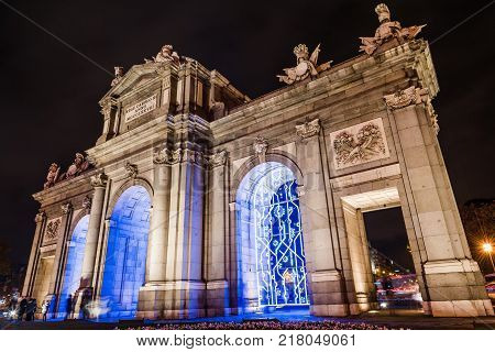 Madrid, Spain - December 8, 2017: Puerta of Alcala in Madrid at night on Christmas time.