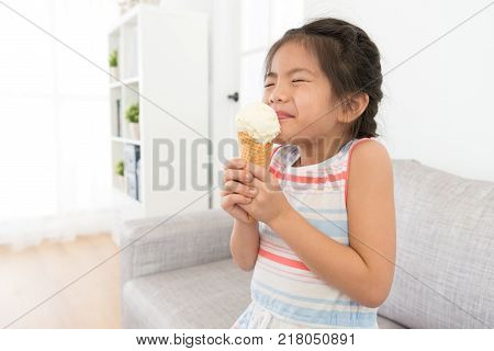 Happy Cheerful Little Girl Kid Holding Ice Cream