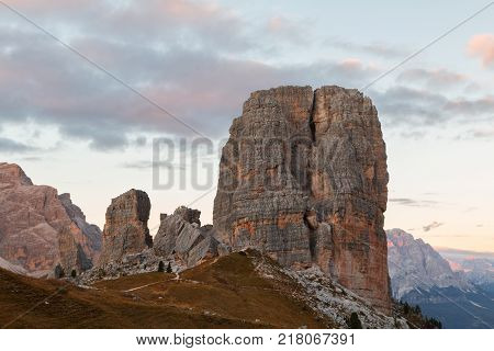 Cinque Torri mountain beautiful autumn colors in Dolomites mountain on the background Tofana peak in valley Cortina D'Ampezzo city at Italy Europe