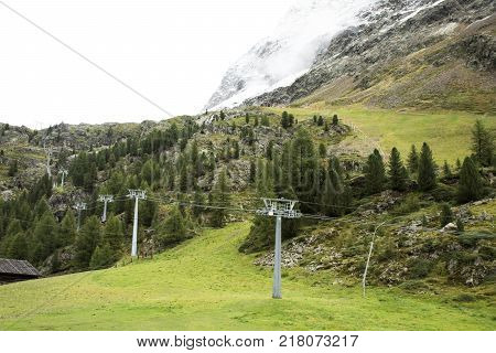 Cable car station for travelers people go to visit and playing ski at top of mountain of otztal alps in Schnals city in Bolzano Austria