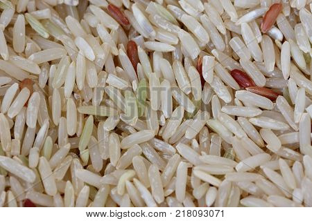 coarse rice or half polished rice background uncooked raw cereals macro closeup