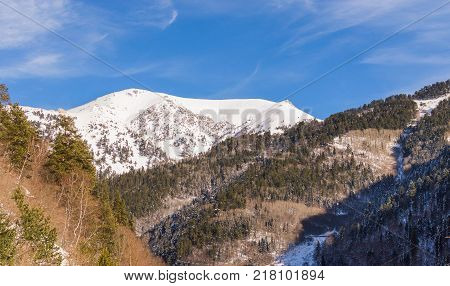Winter mountain landscape with rocks and snow in Russia