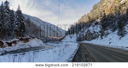 Winter mountain landscape with rocks and snow in Russia