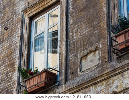 Close up of a rustic window in Rome Italy