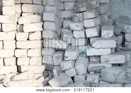 an image of stack of white bricks