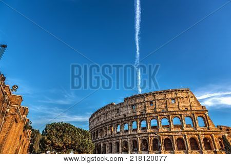 World famous Coliseum at sunset in Rome Italy