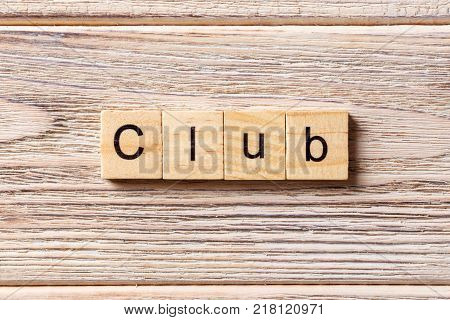 club word written on wood block. club text on table concept.