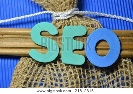 WORD SEO ON AN   ABSTRACT BLUE BACKGROUND