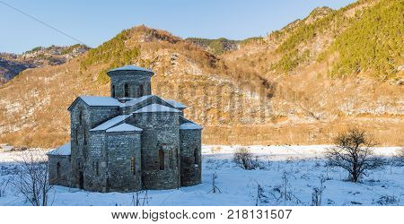 North Caucasus. Lower-Arkhyz settlement. Abandoned orthodox temple. Winter landscape