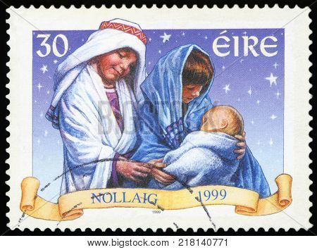 IRELAND - CIRCA 1999: a stamp printed in the Ireland shows baby born, Christmas, circa 1999