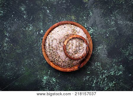 Himalayan salt with dried herbs. Aromatic spices. Selective f ocus