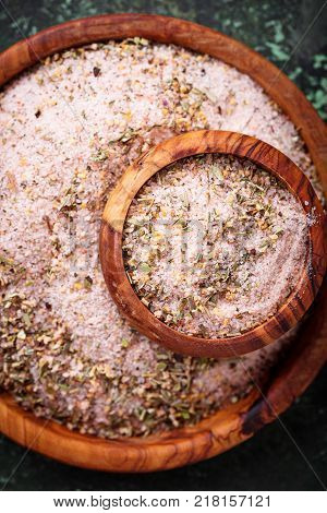 Himalayan salt with dried herbs. Aromatic spices. Selective f ocus
