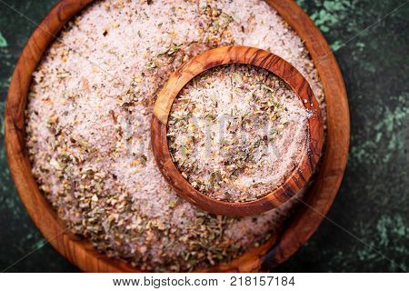 Himalayan salt with dried herbs. Aromatic spices. Selective f ocus